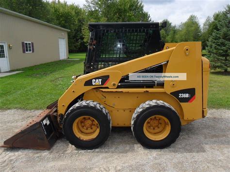 cat 236b skid steer brake release